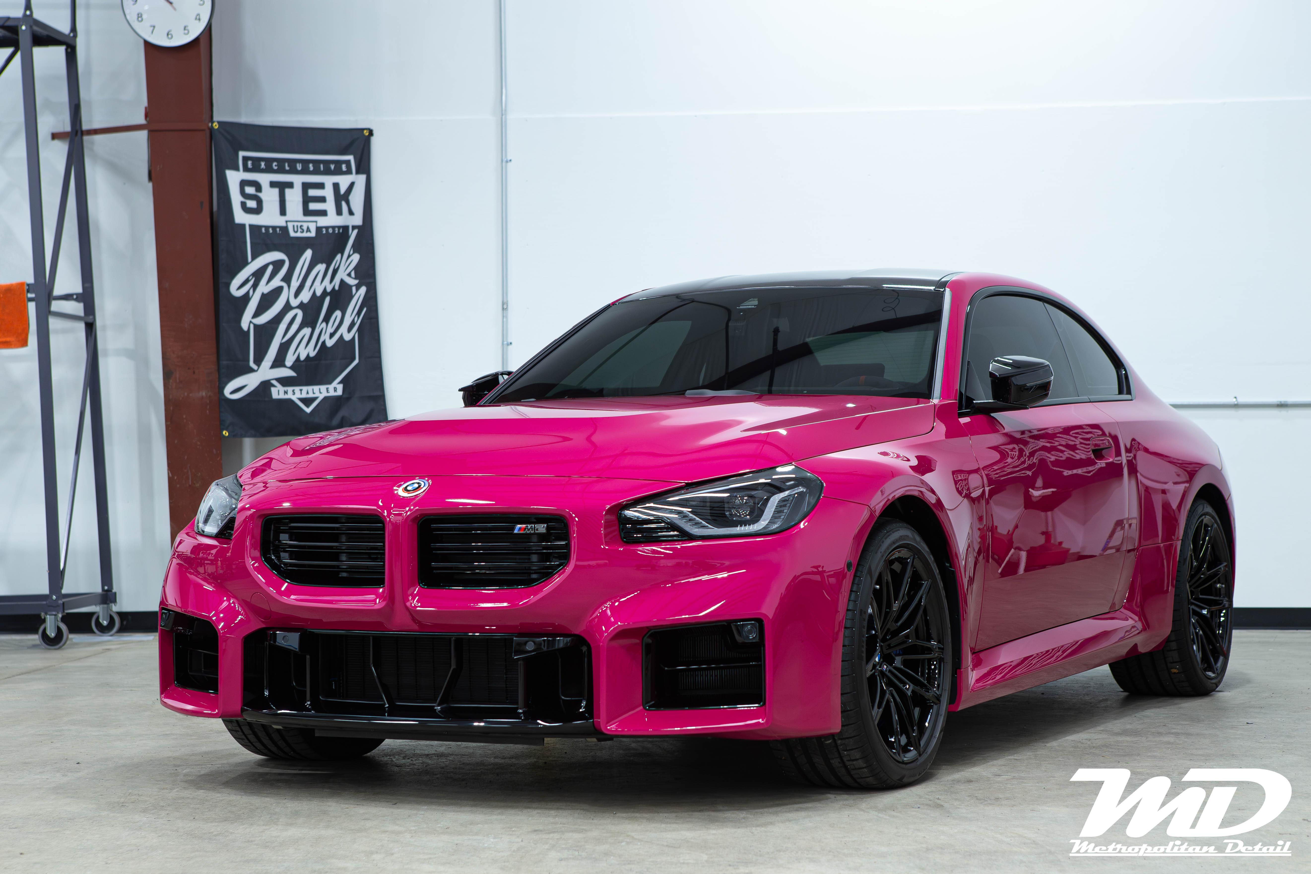 BMW M2 in Ruby Stone finished with STEK DYNOshield